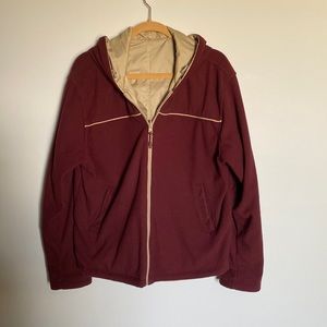 Reversible jacket.  Corduroy on one side, nylon on the other side. Hood has ties